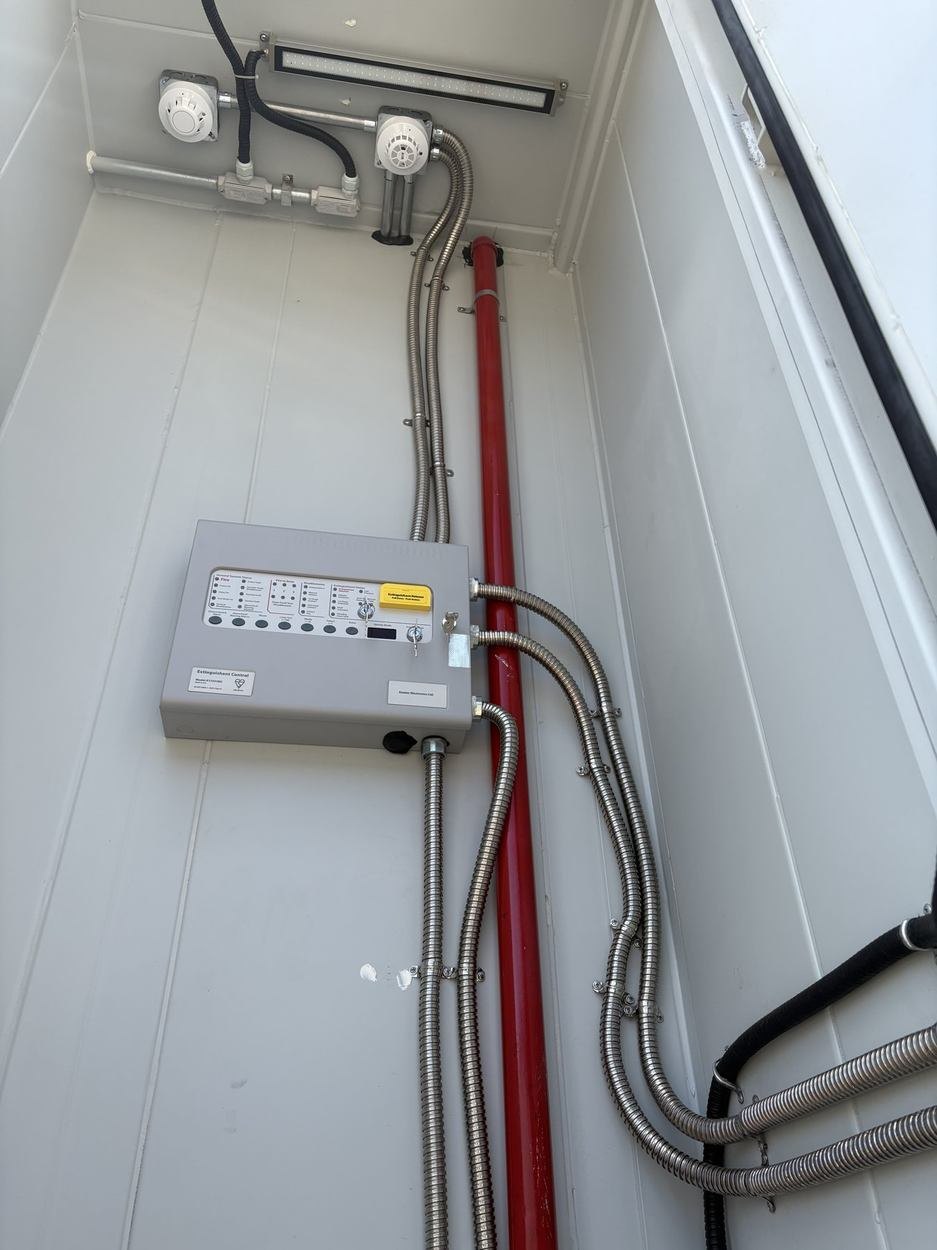 Fire protection system inside an E-HUB energy storage container